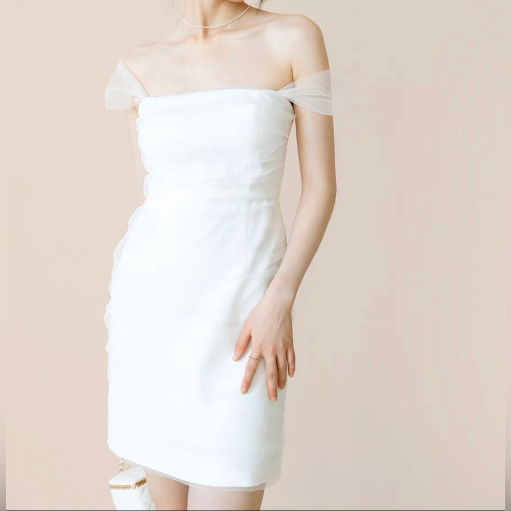 White dress with mesh cover and built in bras.